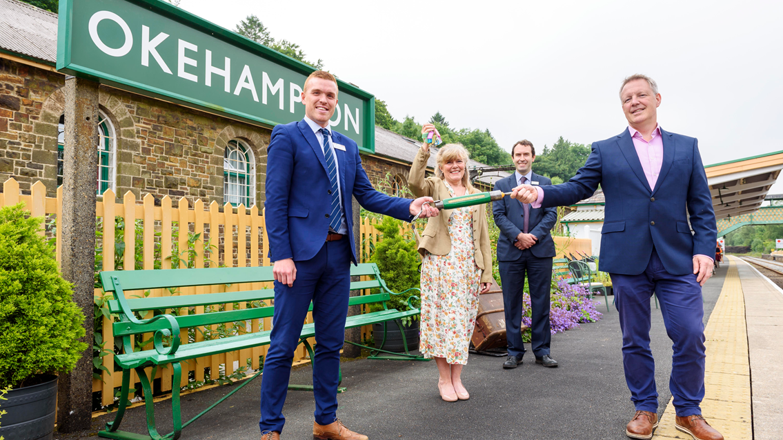 Dartmoor Line and Okehampton Station handover: (left to right) Christian Irwin, Network Rail industry programme director; Councillor Andrea Davis, Devon County Council Cabinet Member for Climate Change, Environment and Transport; Matt Barnes, GWR regional development manager; and Phil Coupland, Aggregate Director, South at Aggregate Industries.