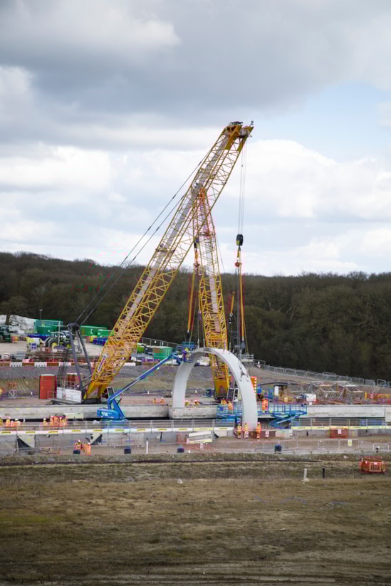 Cranes lifting the first arch for the Sheephouse Wood Bat Protection Structure March 2025