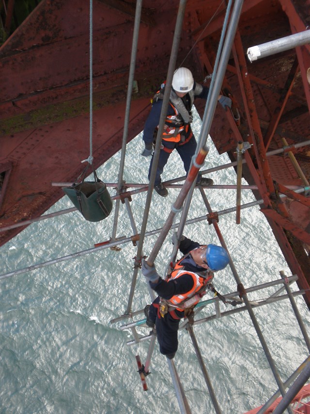 Forth Bridge abseilers and scaffolding: Abseilers are used to build and remove scaffold as well as painting contact points.