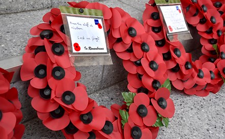 This image shows poppy wreaths at Soldiers Gate in Manchester Victoria station