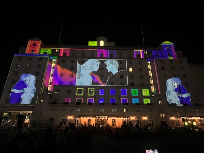Light Night 2025: Among the captivating artworks which lit up the city last night was a spellbinding projection on City Square’s iconic Queens Hotel Entitled One Second Lovestory, created by German artist Dirk Rauscher.
Celebrating 200 years of the modern railway, the piece captures a romantic moment in time when two people’s eyes meet at a busy train station and is sponsored by Markel.