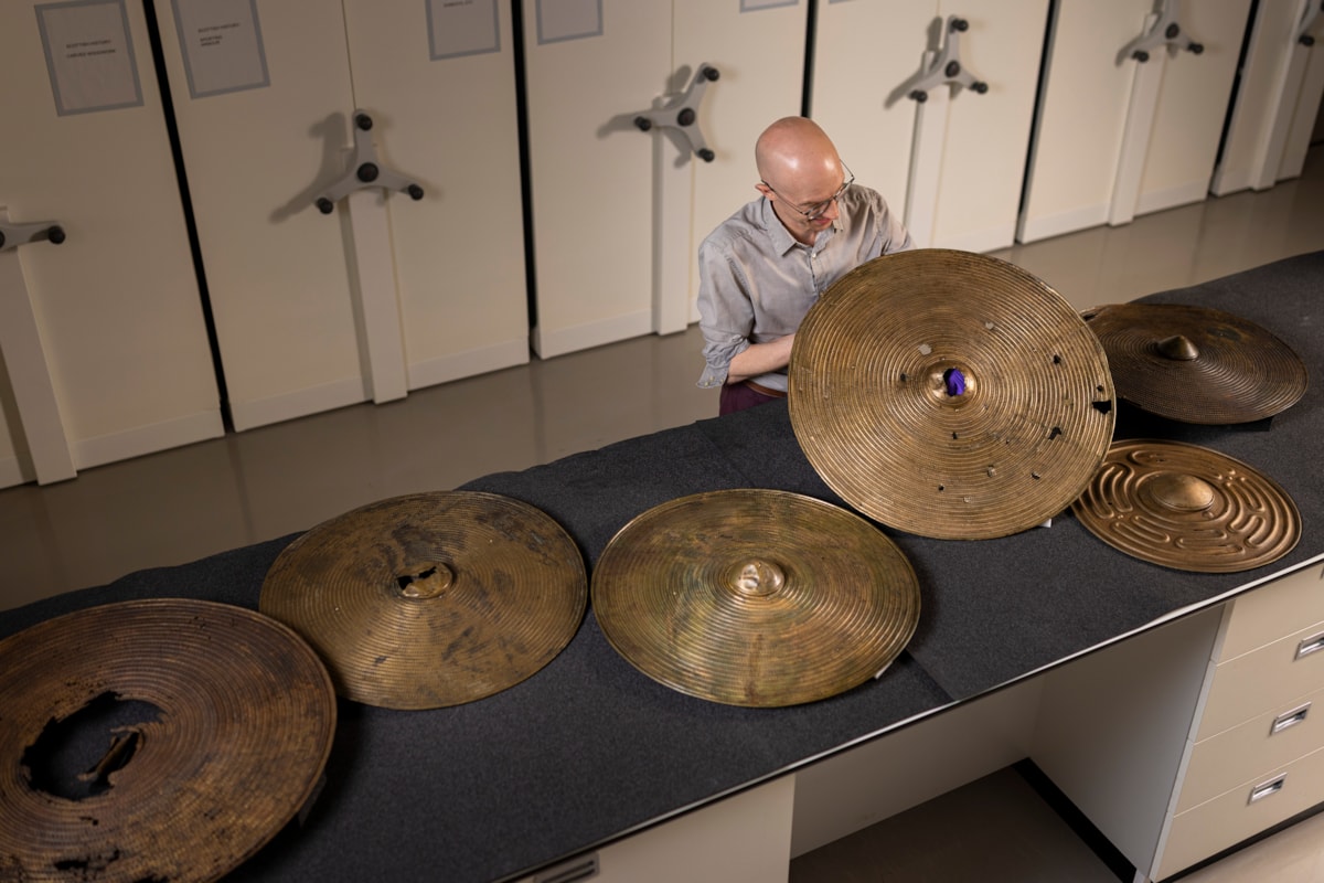 National Museums Scotland curator Dr Matthew Knight with the Bronze Age shields. Photo © Duncan McGlynn (2)