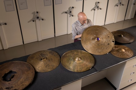 National Museums Scotland curator Dr Matthew Knight with the Bronze Age shields. Photo © Duncan McGlynn (2)