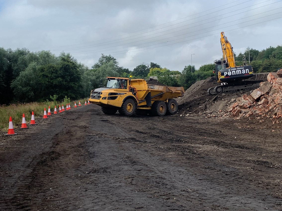 Platform demolition at Cameron Bridge: Debris being cleared from demolition of the old station platforms at Cameron Bridge on the Levenmouth Rail Link project.