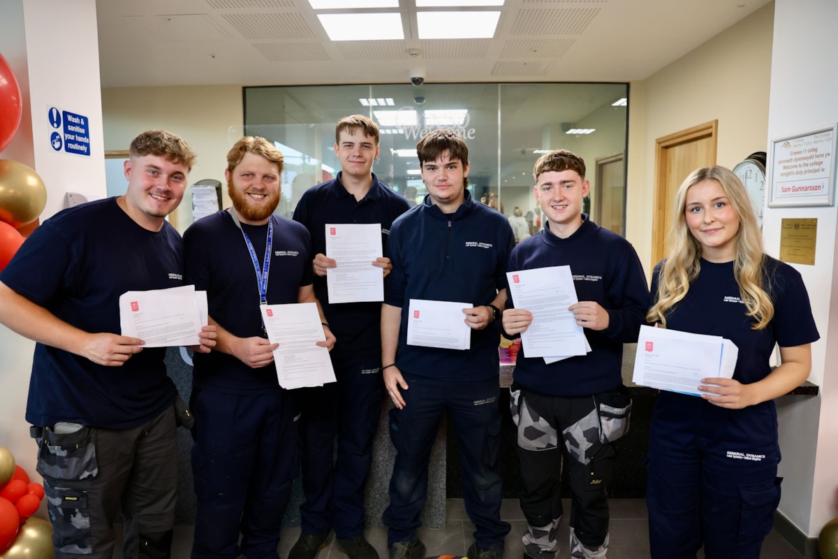 apprentices at Merthyr college receiving results 