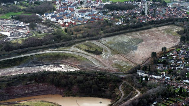 Railway line to be reinforced near former mineral mine in Telford: Aerial view of former mine site beside railway at Hadley near Telford - Date 2014