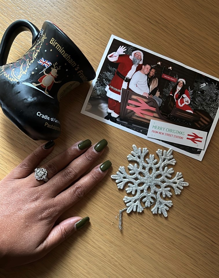 Rachael’s beautiful engagement ring and their polaroid picture souvenir capturing their special moment