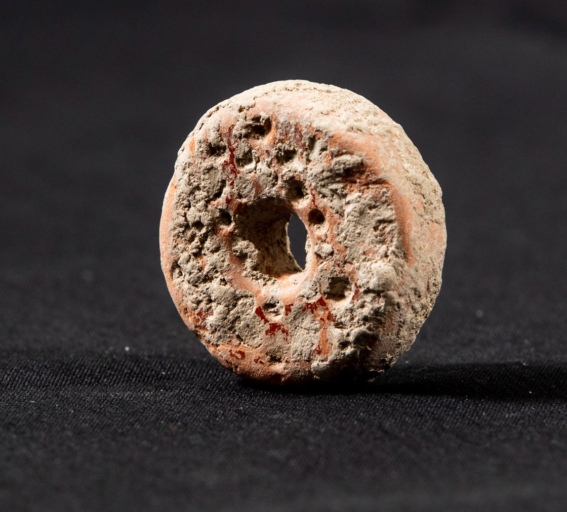 A ceramic bead, made from reused Roman pottery, uncovered during HS2's archaeological excavation of an Anglo Saxon burial ground in Wendover, Buckinghamshire: A ceramic bead, made from Roman pottery, uncovered during HS2 archaeological excavations of Anglo Saxon burials in Wendover.

Tags: Anglo Saxon, Archaeology, Grave goods, History, Heritage, Wendover, Buckinghamshire