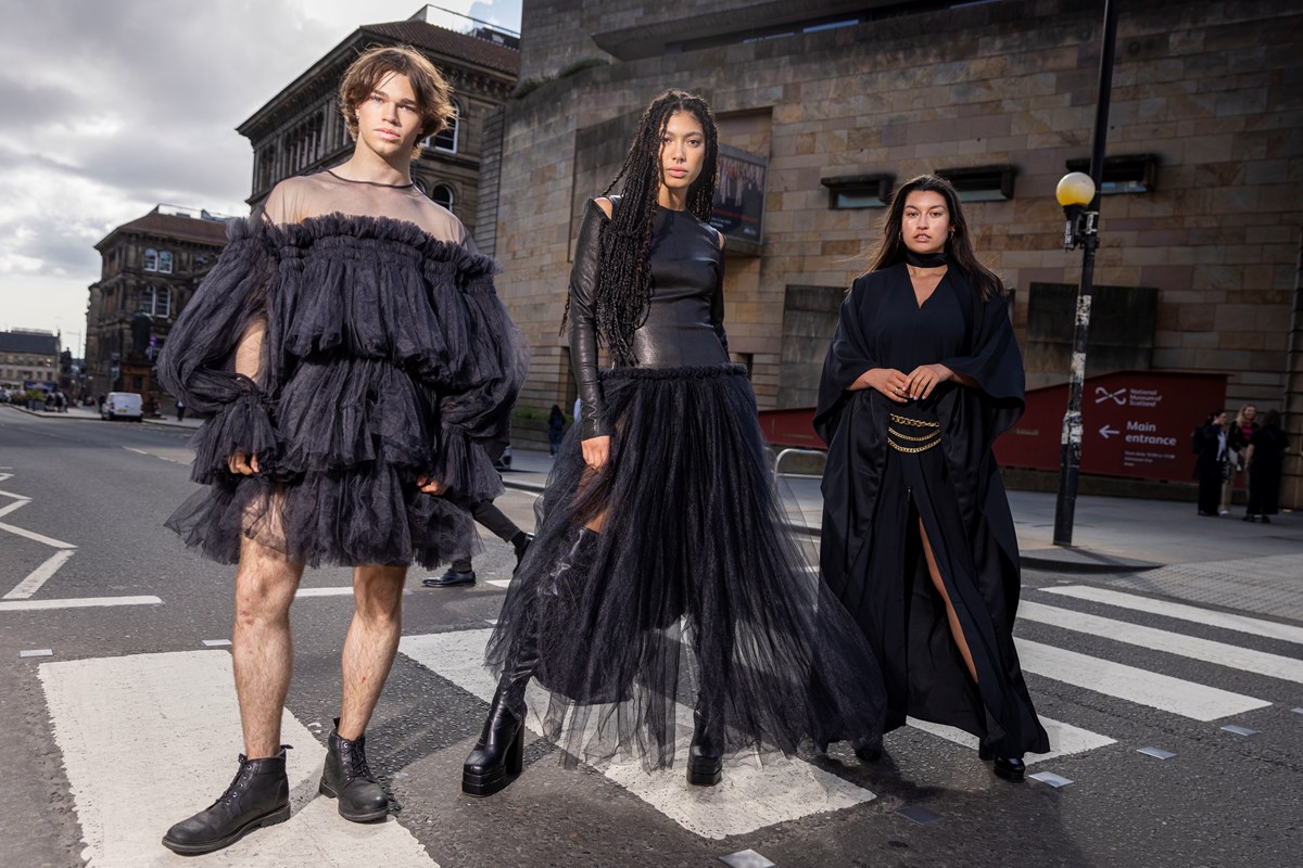 Models (L-R)  Joshua Cairns, Grace Dempsey and Shannon Summers arrive at the National Museum of Scotland ahead of the opening of Beyond the Little Black Dress on  Saturday (1 July). The exhibition deconstructs an iconic wardrobe staple, examining the radical power of the colour black in fashion. Image copyright Duncan McGlynn.-4