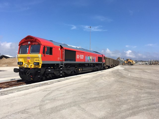 Newly refurbished Newhaven Marine aggregate terminal focuses on freight: 66113 looking stunning as the first loco and freight train out of the newly refurbished Newhaven Marine aggregate terminal