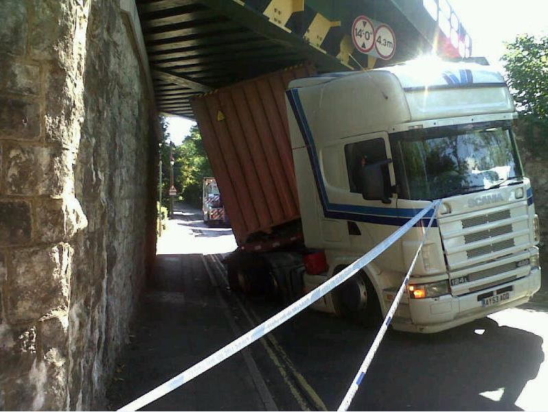 Bridge strike: Lorry wedged beneath railway bridge following bridge strike