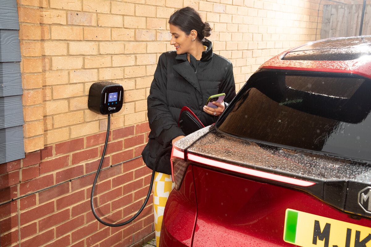 Driving Change: How our partnership with Ohme supports our customers' journey to electric: Motability Operations customer with EV and Ohme charger