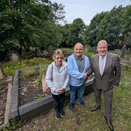 Cllr Damian Corfield at All Saints Graveyard with Paul & Diane Rhodes of the Friends group