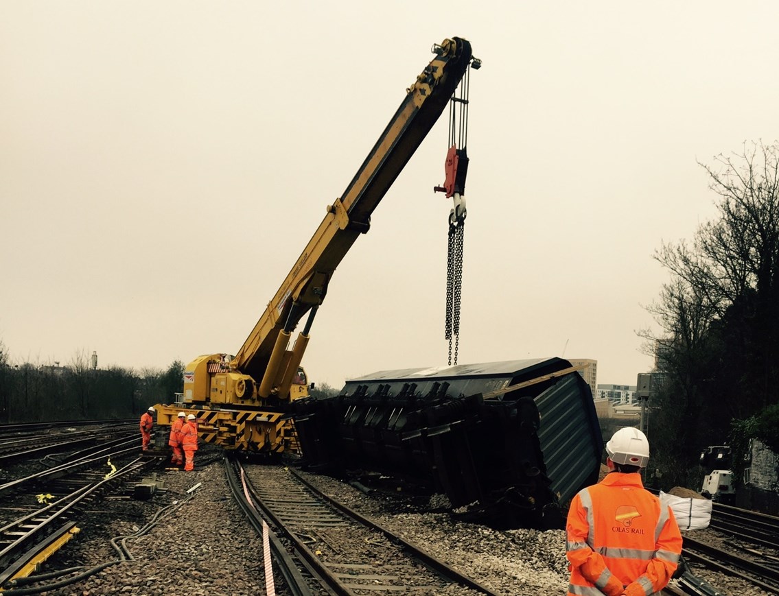 Lewisham derailment latest-2: Lewisham derailment - crane lifts final wagon upright