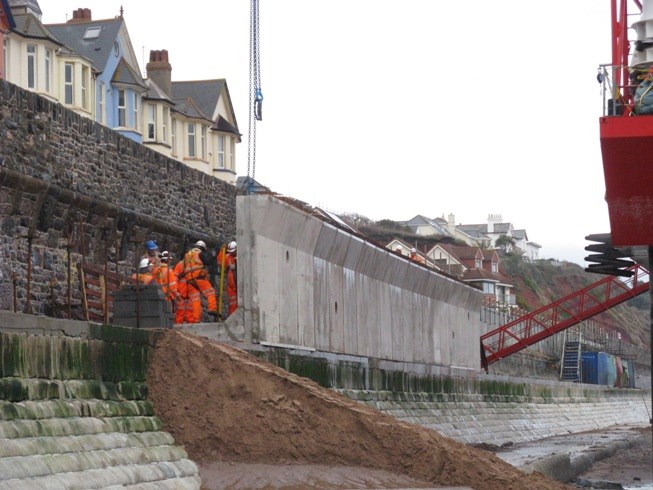 Raising the sea wall to protect the railway at Dawlish