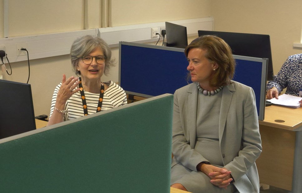 Health Minister, Eluned Morgan, meets a call handler from the Hywel Dda Health Board Waiting List Support Service.