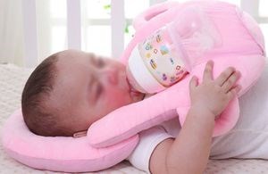 Baby using one of the infant feeding pillows