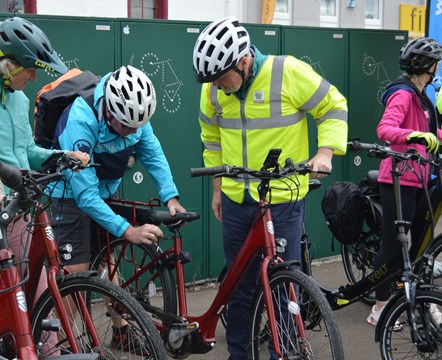 Adjusting electric bike seat