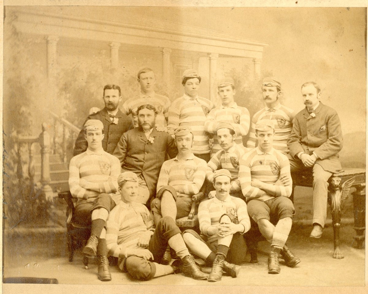 This is the first time the team were given caps and they are proudly wearing them in the picture. They are wearing blue and white hooped shirts. 

Credit: Scottish Football Museum.