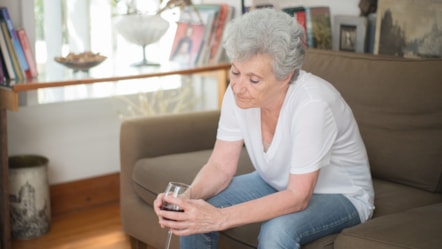 Woman with glass of wine