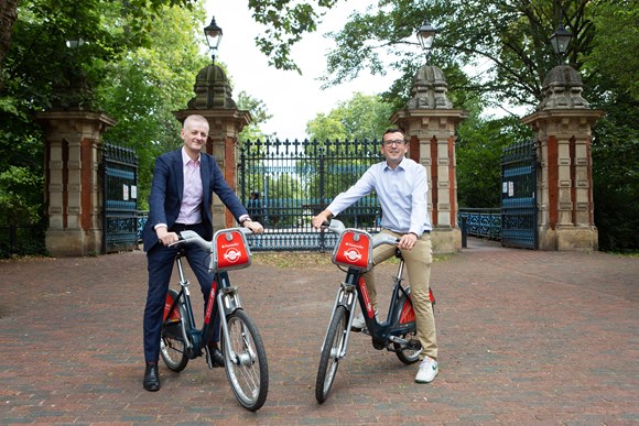 TfL Press Release - New Santander Cycles docking station opens at Victoria Park to boost capacity: LB Tower Hamlets Image - Cllr David Edgar and Walking and Cycling Commissioner Will Norman in Victoria Park