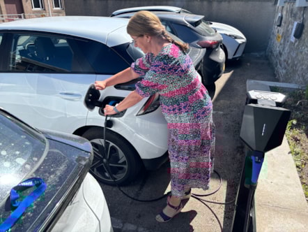 Moray Council Leader, Cllr Kathleen Robertson with EV charger extra