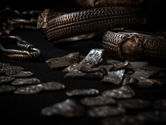 The Viking treasure known as 'the Silverdale hoard,' consisting of pieces of silver such as jewellery, coins and ingots, which was discovered near the village in 2011.