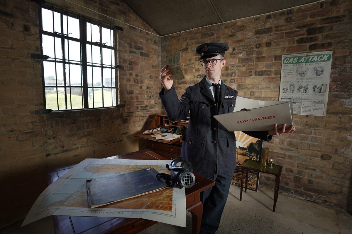 Historical re-enactor Terence Finnegan makes final preparations for a new escape room experience the National Museum of Flight. Image © Stewart Attwood (3)