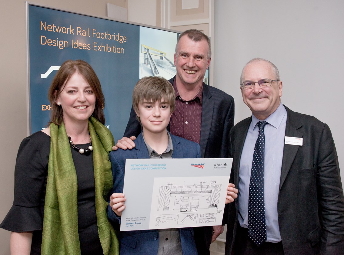10-year-old boy praised for entry in Network Rail’s footbridge design competition: William Tonk and parents with Sir Peter Hendy
