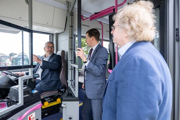 First Bus Scotland Managing Director Duncan Cameron shows ACC Co-Leader Cllr Christian Allard (driver seat) and Ian Yuill inside Aberdeen's newest EVs