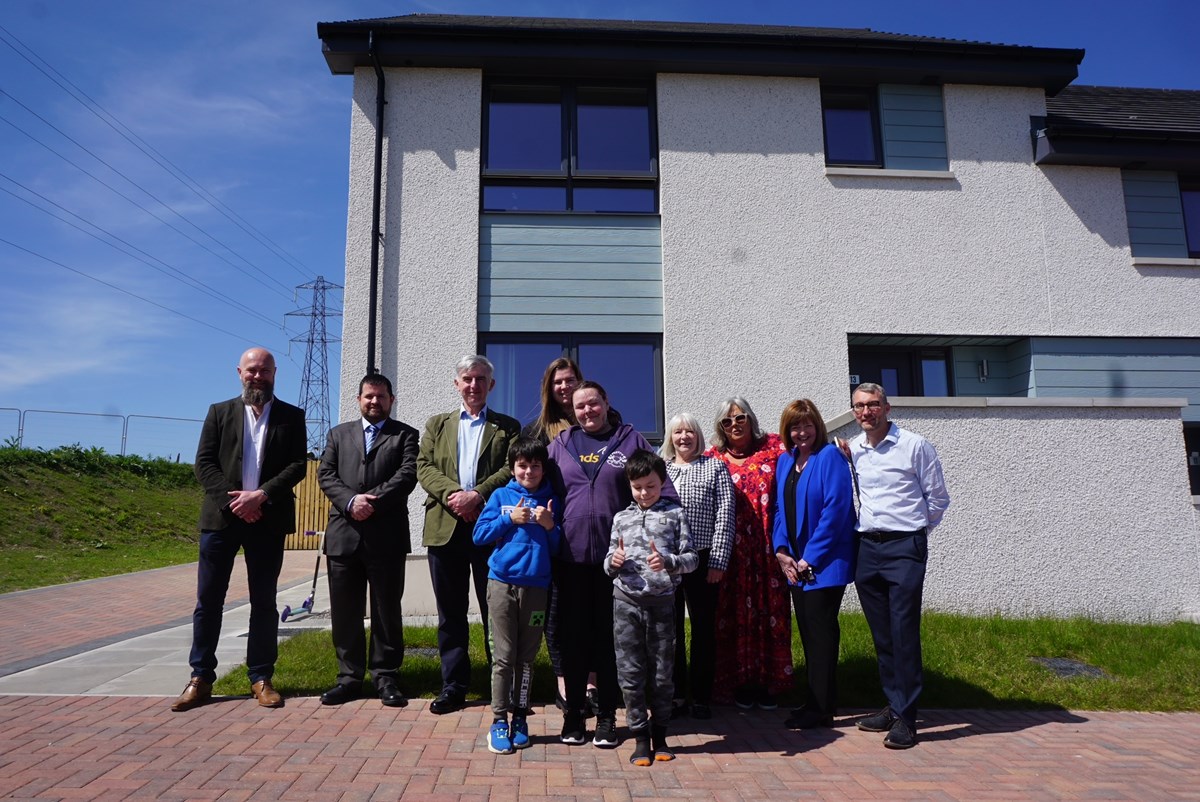 New council houses in Keith handed over to Moray Council from Springfield Properties.
From left to right: Springfield Partnerships Managing Director, Tom Leggeat; Moray Council’s Head of Housing, Edward Thomas;  Cllr, Donald Gatt; Chair of Moray Council’s Housing and Community Safety Committee, Cllr
