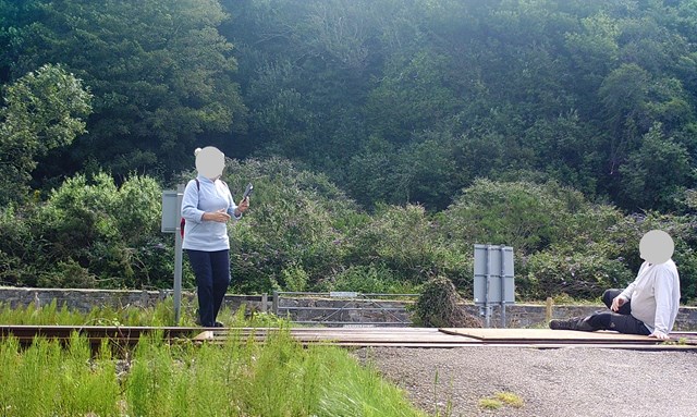 A man sits on the track at Harlech for a photo