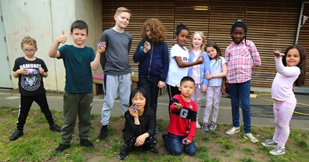 Children from Three Corners Adventure Playground with solar powered toy cars