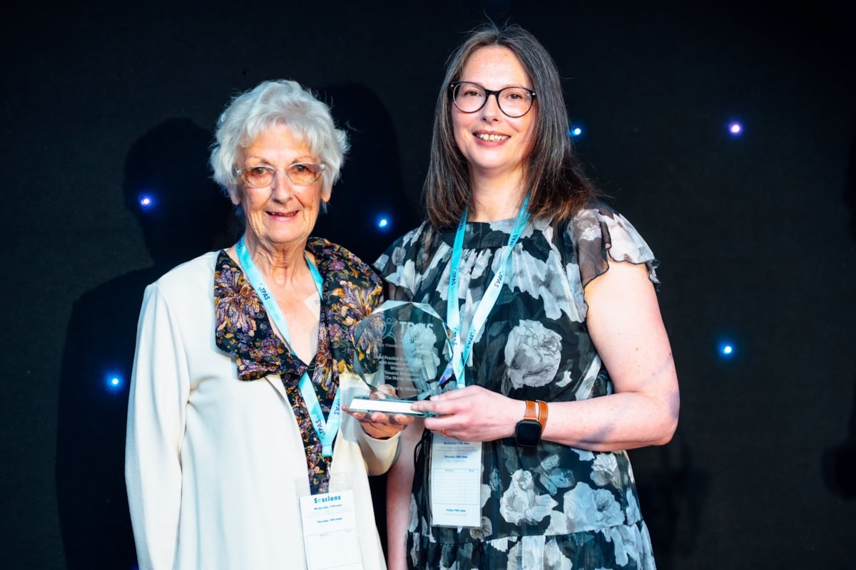 Tenant member of Moray Council's Tenant Editorial Panel, Liz McKnockiter (left) and Tenant Participation Customer Engagement Officer, Rebecca Irons (right) with the 'Good Practice in Communicating with Tenants and Residents' Award from the Tenant Participation Advisory Service Scotland Awards 2026.