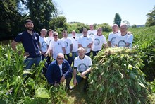 SISI project - Al Reeve, Scottish Invasive Species Initiative Project Officer with volunteers from Chivas Brothers - June 2018 - credit Ewen Weatherspoon