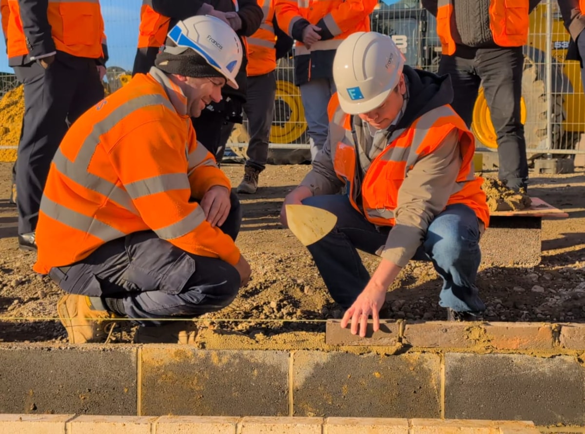 Cllr Yeo brick laying Dwyer Rd