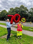 Cllr Richard Roberts celebrating 70 years of school crossing patrols with a school crossing patrol in Kings Langley: Cllr Richard Roberts celebrating 70 years of school crossing patrols with a school crossing patrol in Kings Langley