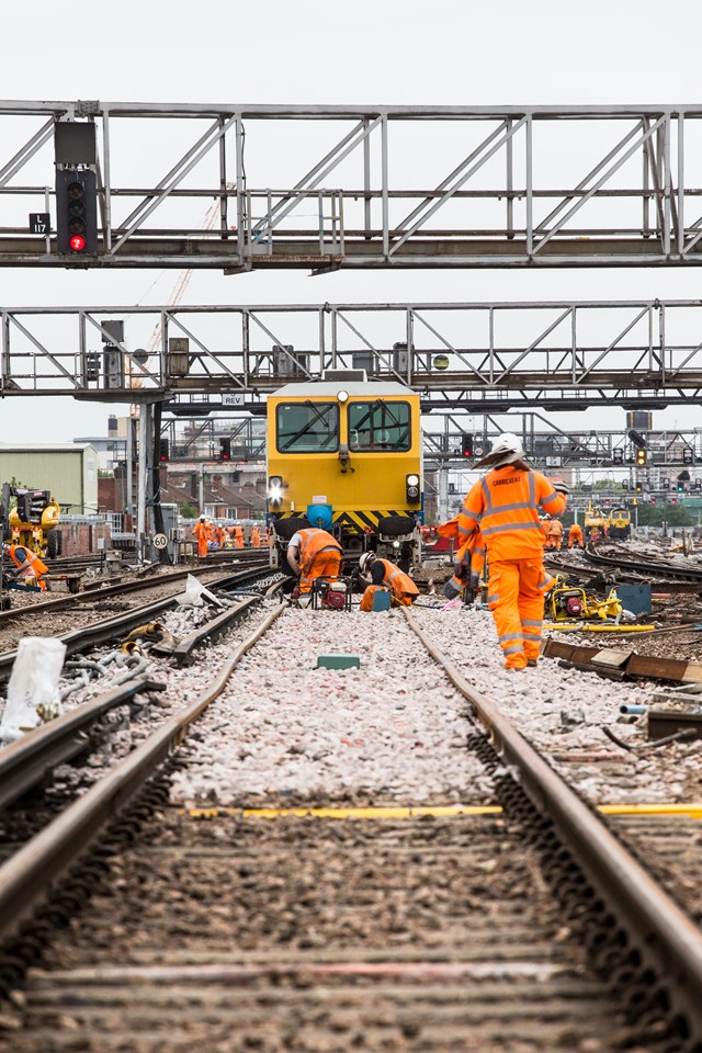 London Bridge - signal engineers at work before tamping can start