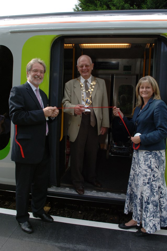 Cutting the ribbon 1: Cllr Stuart Pile, Herts County Council (left) and Anne Main MP (right) with the Mayor of St Albans, Cllr Chris Oxley.