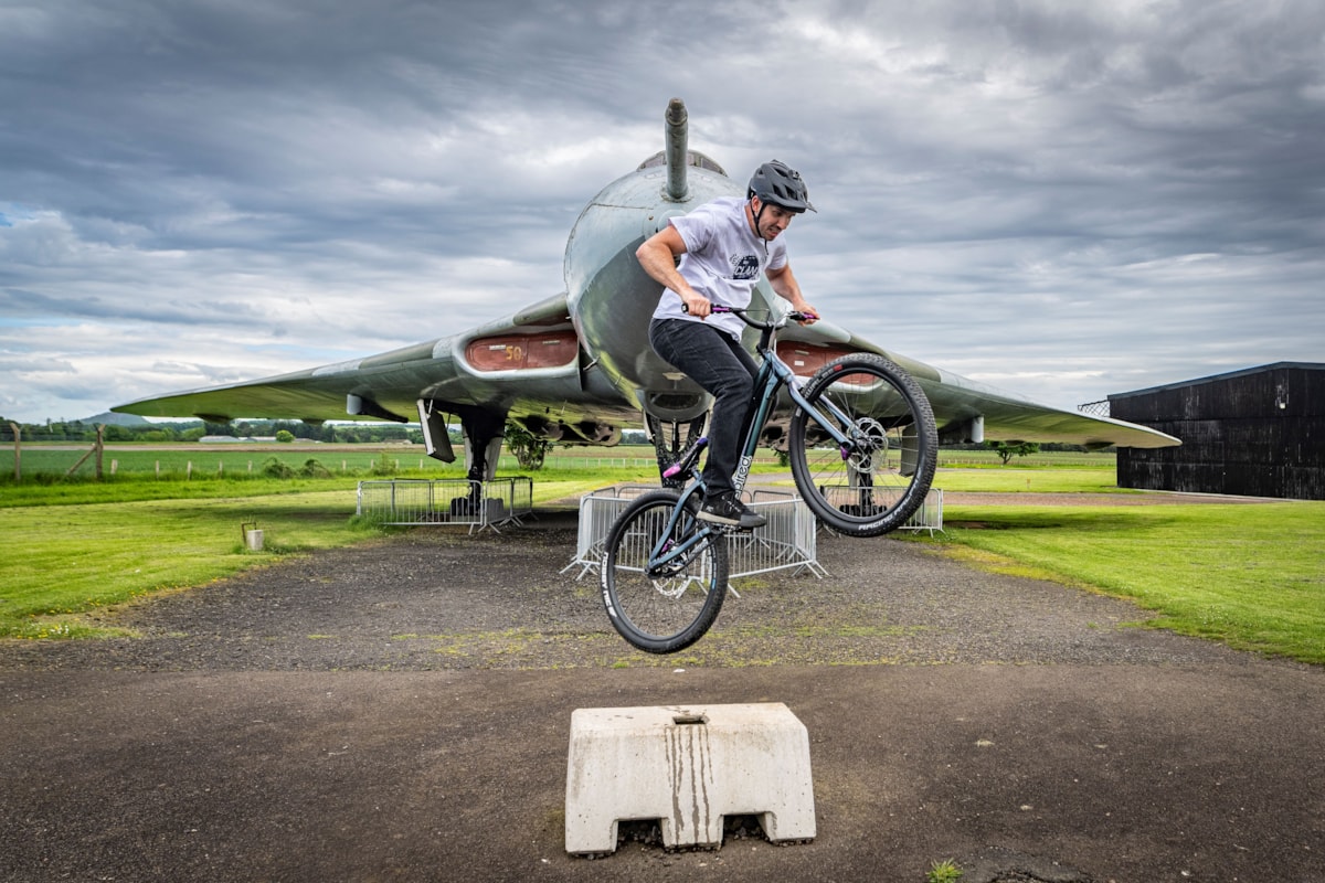 Cycling stunt team The Clan practice ahead of 360 Fest at the National Museum of Flight. Photo (c) Andy Catlin-2