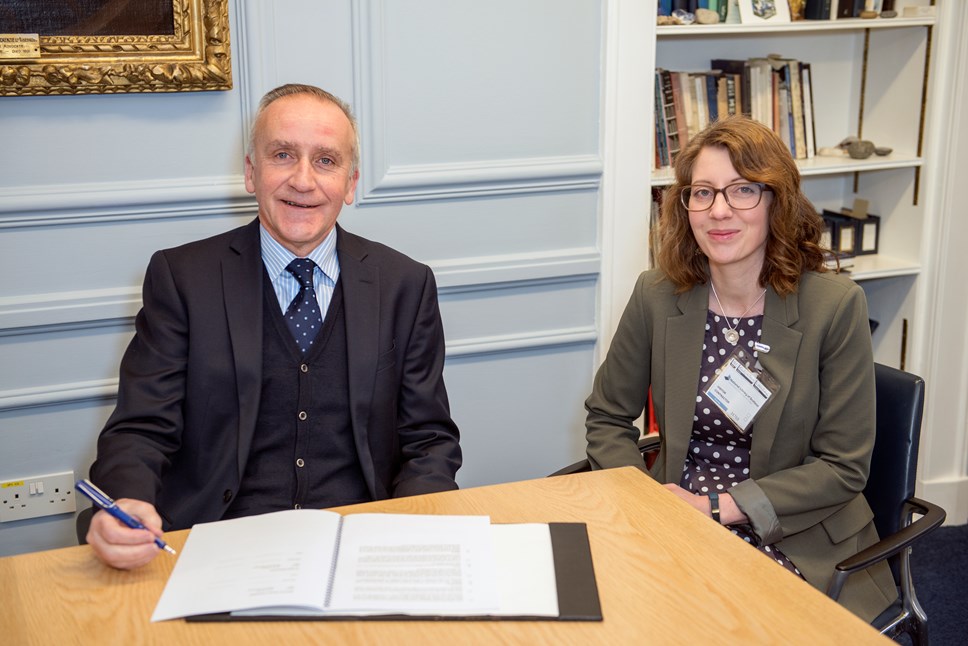 National Librarian Dr John Scally and Scottish Enterprise's Research Manager Emily Wilson at the formal signing of the partnership agreement