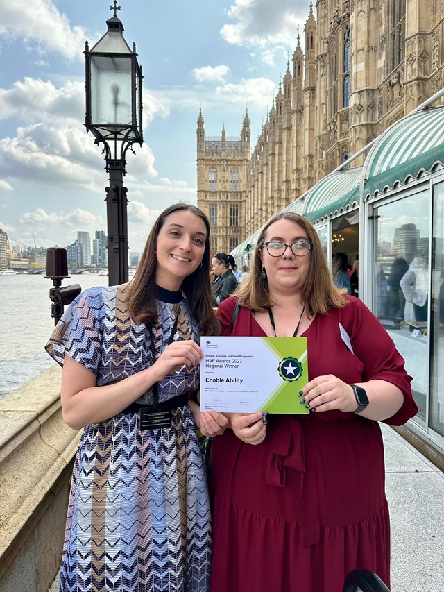 Mia Sandells and Georgia Hescott receive their award: Left to Right: Mia Sandells, Inclusive Playscheme Team Leader and Georgia Hescott, Paulsgrove Playscheme Team Leader with their award