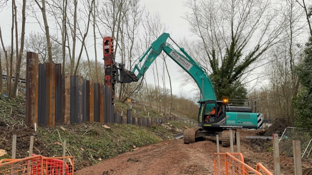 SURREY: Line between Guildford and Effingham Junction reopens following completion of emergency work to stabilise an embankment in Clandon: Clandon piling