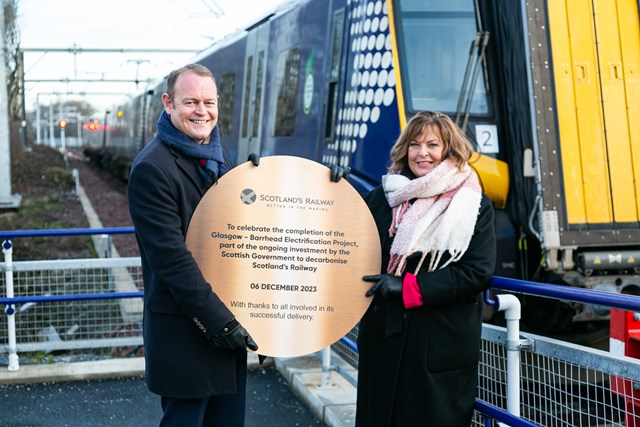 First electric train Barrhead 2: Scotland's Railway Managing Director Alex Hynes with Transport Minister Fiona Hyslop MSP at Barrhead station.