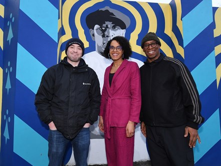 A new mural commemorating the No More Red campaign is unveiled at Rosemary Gardens. Pictured from left to right are Islington Assistant Parks Manager Andrew Hillier, Council Leader Cllr Comer-Schwartz, and Arsenal legend Ian Wright