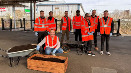 Image shows employees from Northern working at Bolton station