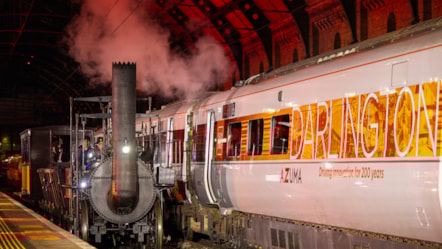 Locomotion No 1 pulling into Darlington Station  alongside LNER Azuma 'Darlington'