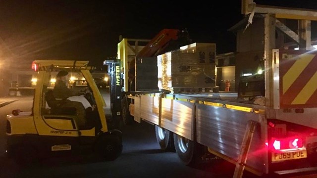 Network Rail supports army to deliver vital medical face masks to NHS frontline: Pallets of face masks being unloaded in Hampshire
