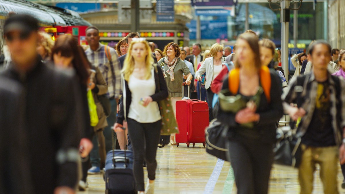 photo - Passengers on station platform