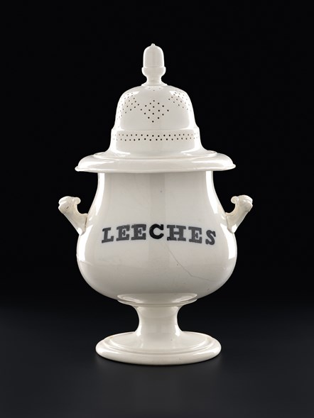 Leech jar and lid of white glazed earthenware 01. Photo © National Museums Scotland